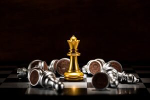 Gold,Queen,Chess,Surrounded,By,A,Number,Of,Fallen,Silver